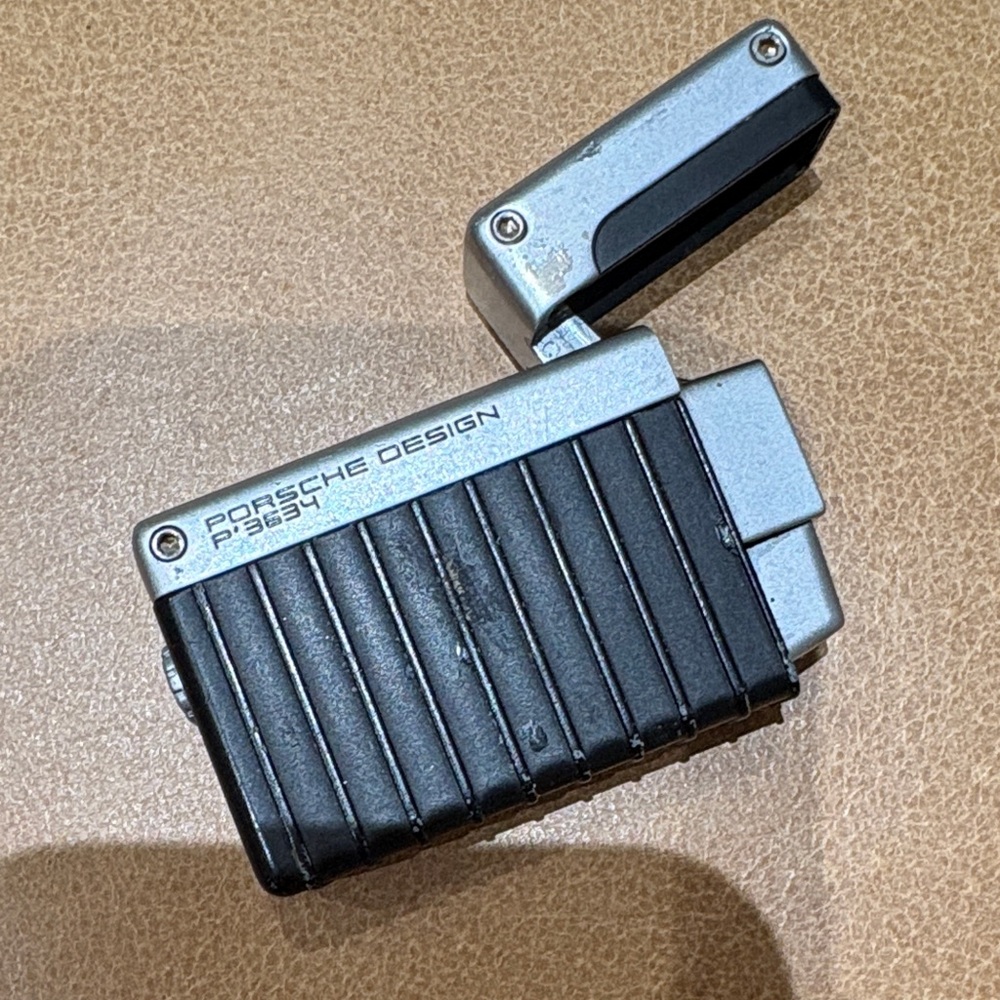 Porsche Design P'3634 Laser Flame Silver and Black Lighter. Collectible item.